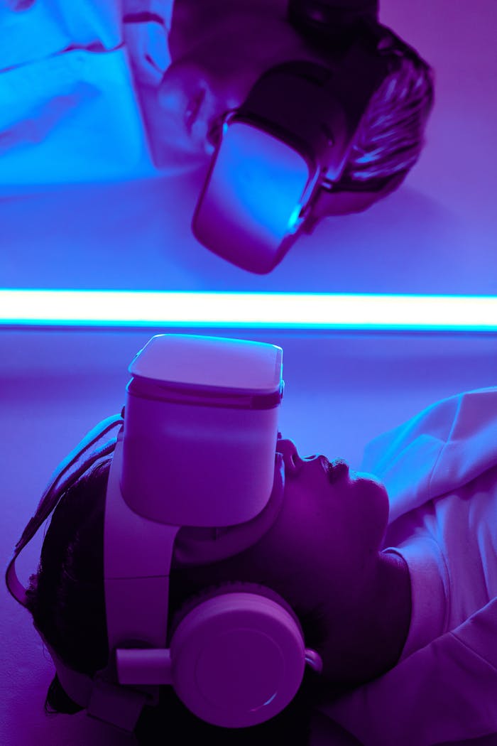 Close-up of a person using a VR headset under neon lights, reflecting futuristic themes.